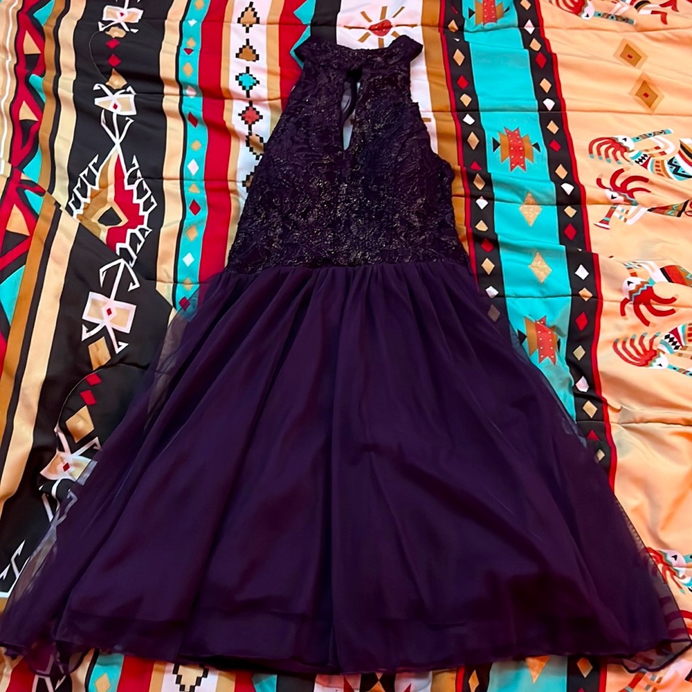 I am selling a dark purple dress for a nice occasion